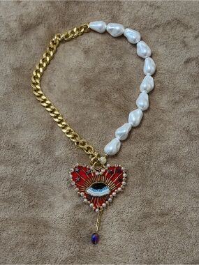 Gold & White Pearl Heart Pendant Necklace with Red Enamel Eye Detail